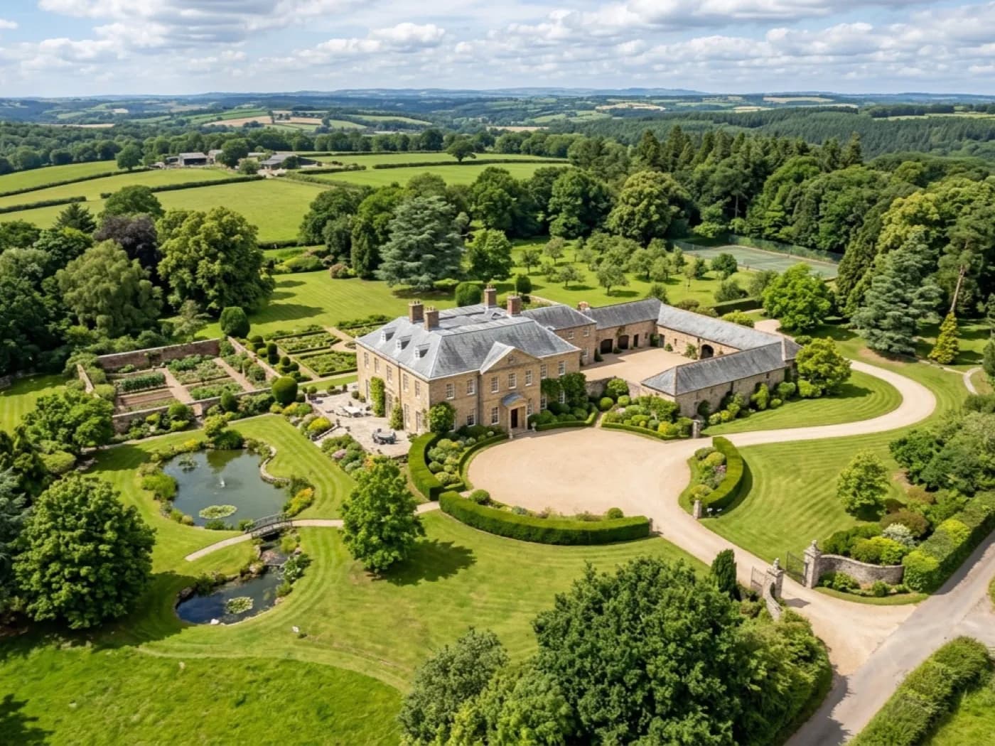 High resolution aerial photograph of a Devon property and its grounds taken from a drone